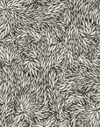 Black and white small scale botanical wallpaper with a dense, abstract leaf pattern creating a bold, high-contrast design.