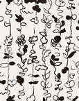 Black and white abstract floral stripe wallpaper with hand-drawn botanical elements, featuring wavy vines, leaves, and blooms in an artistic, freeform style.