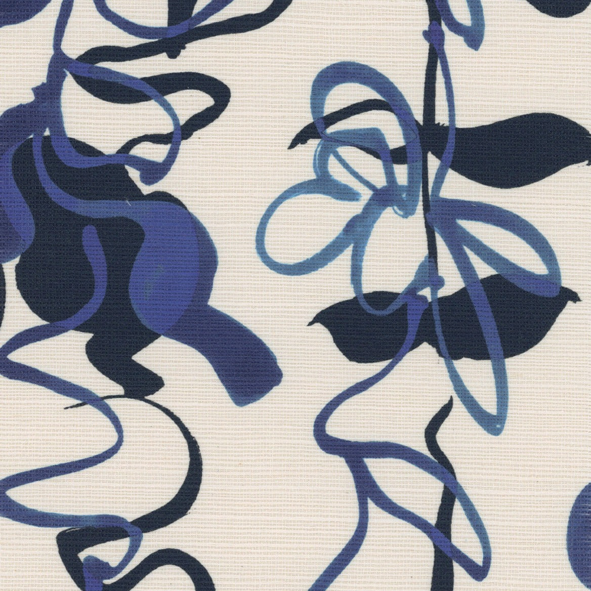 Close-up of grasscloth wallpaper with blue floral line drawings on a textured off-white background.