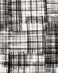 Abstract black and white plaid wallpaper with a watercolor wash effect, creating an artistic and textured grid pattern.