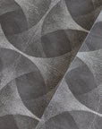 Modern dark grey wallpaper with an abstract geometric pattern of interconnected curved shapes, highlighted by delicate white dotted detailing, creating a dynamic, textured effect.