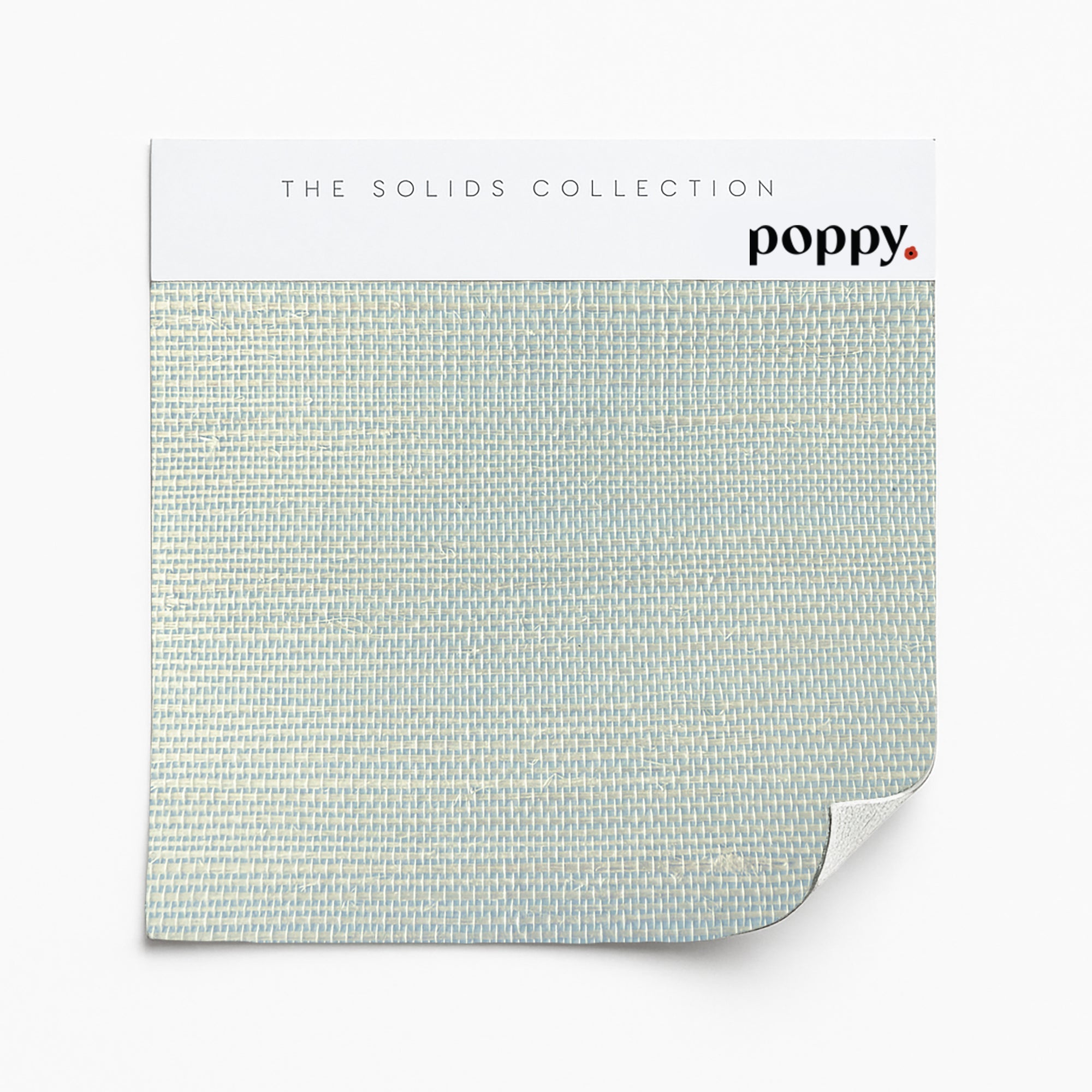 Light mint green grasscloth wallpaper sample with a fine, natural weave from Poppy Print Studio’s Solids Collection.