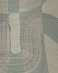 Close-up of opal toned grasscloth wallpaper, showcasing the soft brushstroke design and textured surface.