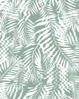 Sage green and white tropical palm leaf wallpaper with a soft, undulating ripple effect across the foliage design.