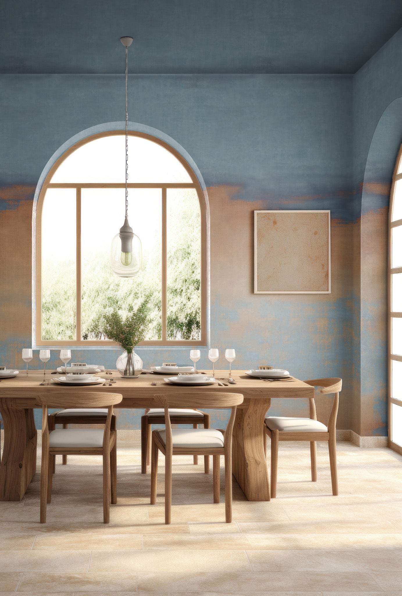Blue and sandy beige gradient wallpaper with a painted sky effect, wrapping around a modern dining room with arched windows and wood furniture.
