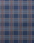 Flat lay of navy plaid wallpaper with layered brown, beige, and soft blue stripes, creating a structured, heritage-inspired linen wallpaper pattern.