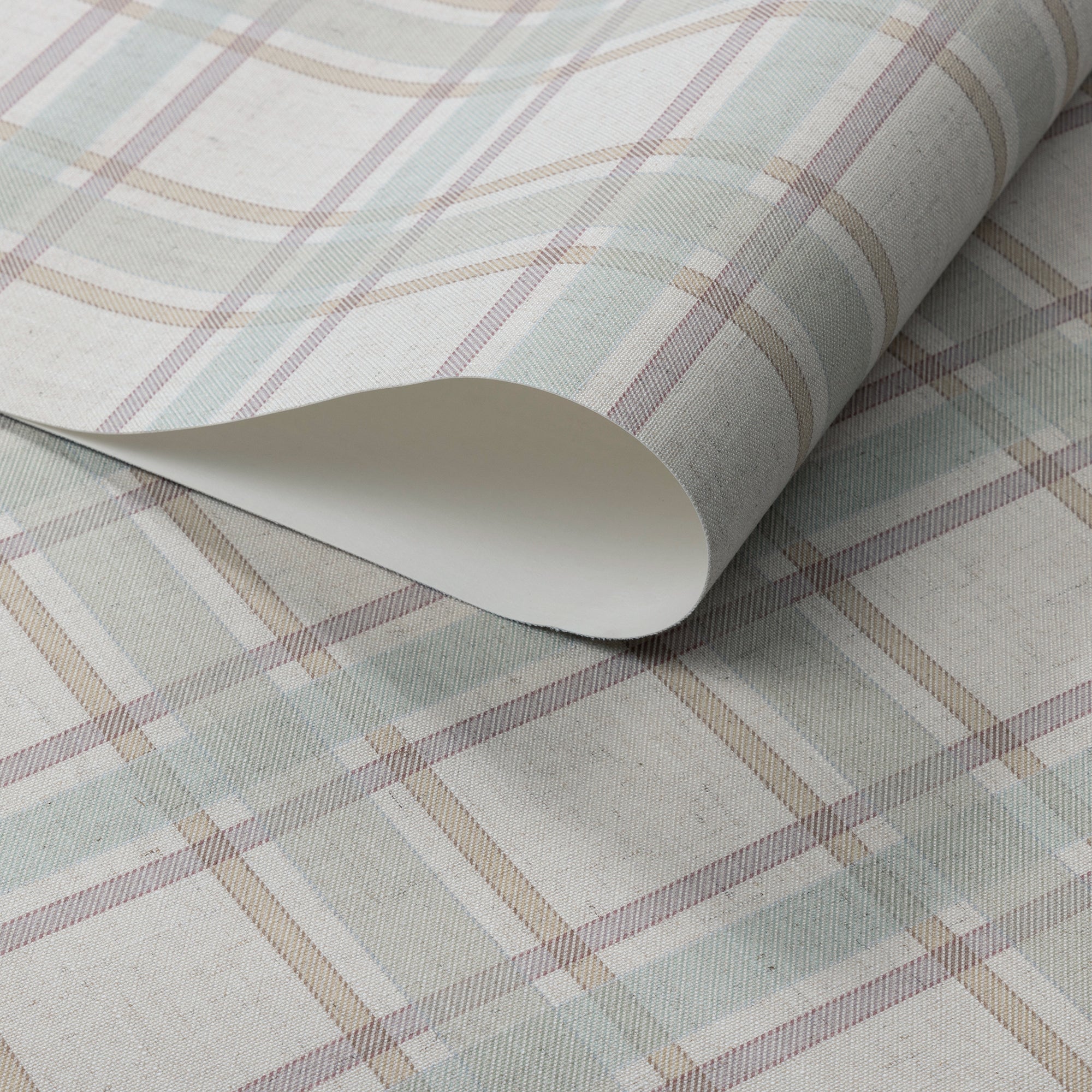 Rolled linen wallpaper featuring a soft pastel plaid pattern in muted sage green, taupe, and mauve on a cream-toned woven-texture background.