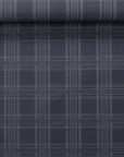 Partially unrolled charcoal plaid linen wallpaper with crisp plaid lines in brown and grey, showcasing its structured pattern and textile-like surface.