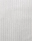 Flat view of striped wallpaper in neutral beige and cream tones with a woven, fabric linen texture.
