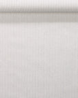 Rolled real linen wallpaper showcasing fine vertical stripes in light beige and white.