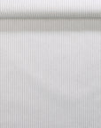 Rolled linen wallpaper with subtle vertical stripes in cool grey and ivory tones.