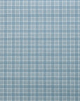 Flat view of linen wallpaper featuring a classic vintage plaid check pattern in dusty blue and white.