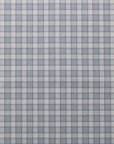 Flat view of linen wallpaper featuring a vintage plaid check pattern in blue and off-white.