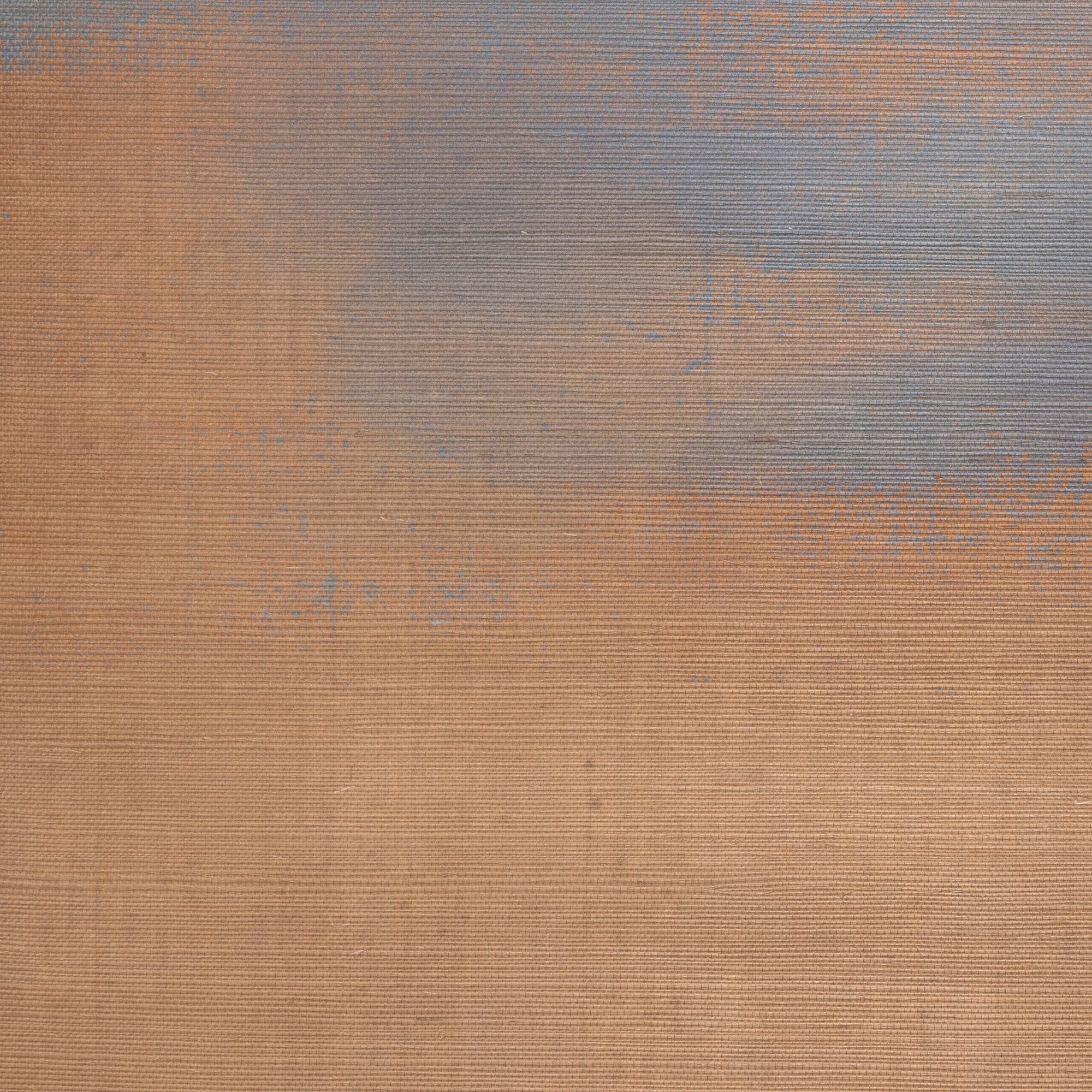 Grasscloth wallpaper with a painterly ombré effect blending warm terracotta and muted slate blue tones.