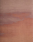 Warm-toned grasscloth wallpaper featuring a soft gradient of blush, terracotta, and muted mauve hues with a textured, painterly finish.