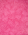 Close-up of pink wallpaper with an abstract organic pattern of undulating magenta lines, adding movement and vibrancy.