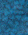 Deep navy wallpaper with electric blue swirling wavy lines radiating from circular
centers, partially unrolled to showcase the bold pattern.