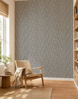 Black and cream leafy floral commercial wallcovering installed in a sunlit reading nook