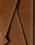 Brown velveteen upholstery fabric by the yard, folded showing drape and weight