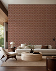 Terracotta stippled geometric wallpaper installed in a modern living room
