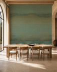 Sage green and gold ombre mural commercial wallcovering installed in a sunlit dining room