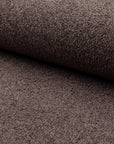 Brown boucle upholstery fabric by the yard, rolled bolt view