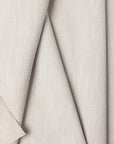Beige basketweave upholstery fabric by the yard, folded showing drape and weight
