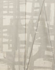 Natural cream brushstroke crosshatch linen fabric by the yard, folded showing drape and weight