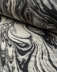 Black and cream marbled abstract linen fabric by the yard, rolled bolt view
