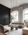 Luxury loft living room with white rug and modern sofa. Black and white square wallpaper