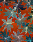 Orange red background with floral pattern wallpaper foreground
