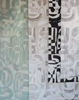 A collection of abstract wallpaper samples displayed side by side, featuring large-scale brushstroke patterns in various colorways, including sage green, beige, black and white, and soft gray.
