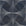 Abstract wallpaper design featuring an dark navy background with intricate white dot patterns forming organic, flowing shapes, creating a dynamic and textured visual effect.