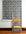 Gray geometric wallpaper with curved circular overlapping shapes, featuring delicate dotted texturing and abstract interconnected design, with yellow folding chair in foreground