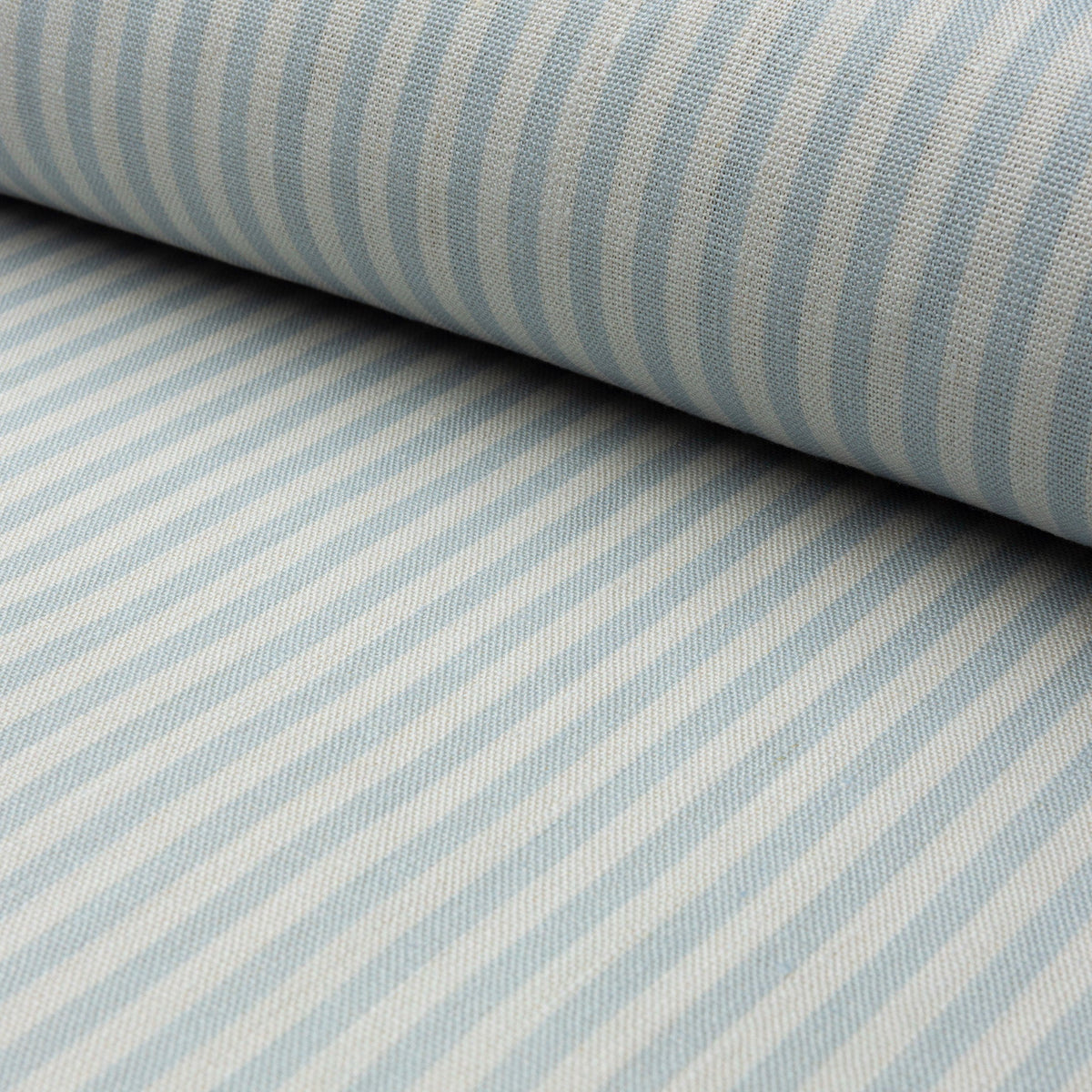 Light blue and cream striped linen fabric by the yard, rolled bolt view