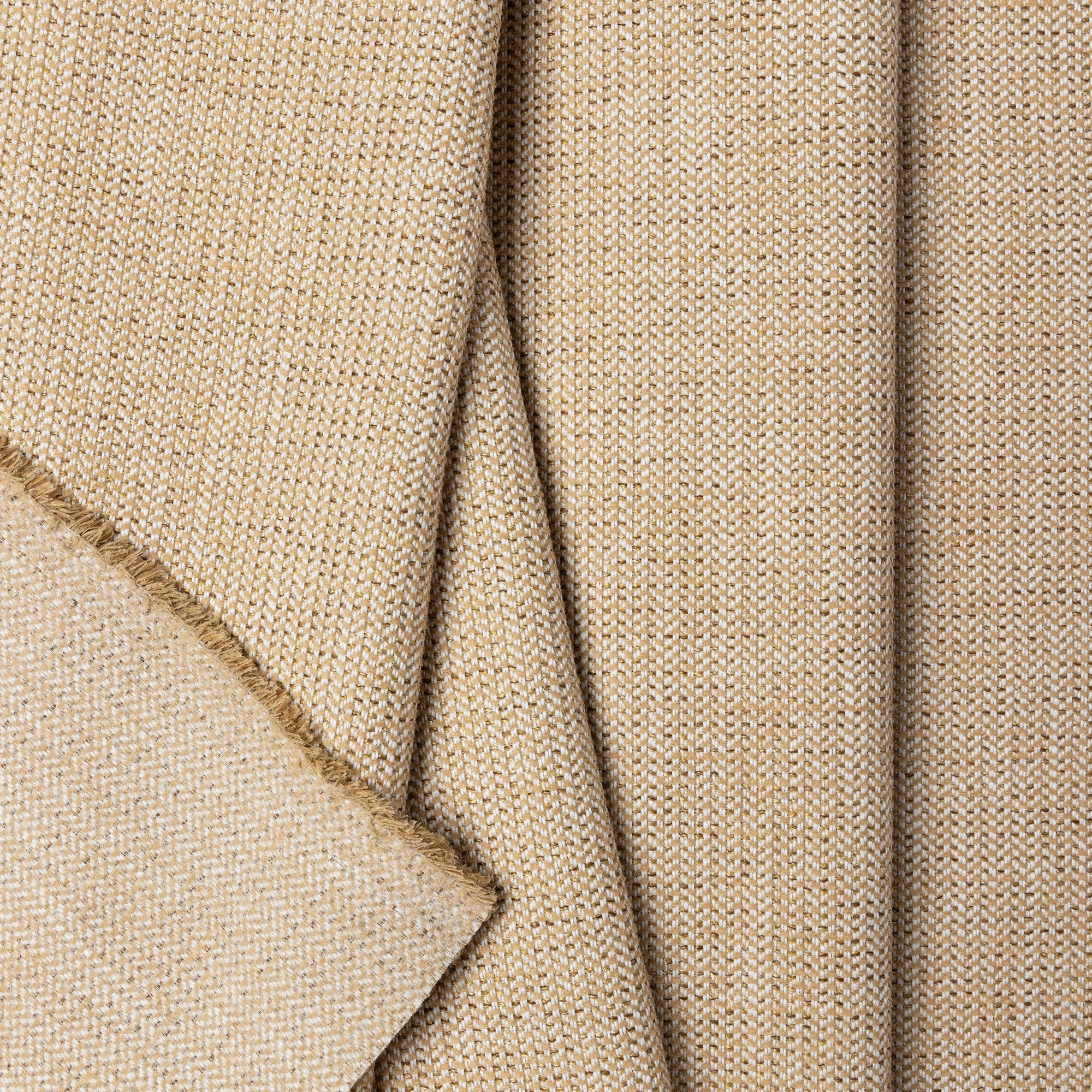 Gold herringbone outdoor fabric by the yard, folded showing drape and weight