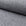 Gray herringbone outdoor fabric by the yard, rolled bolt view