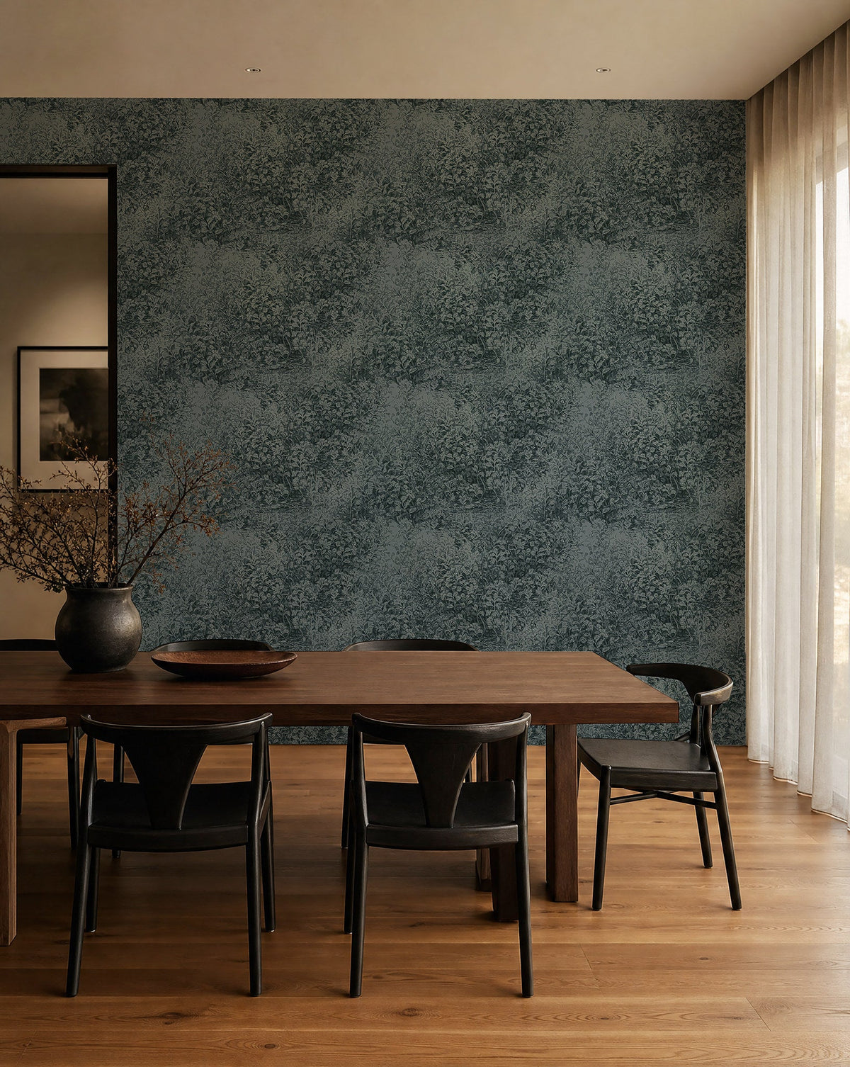 Slate blue hand-sketched foliage wallpaper installed in a dining room