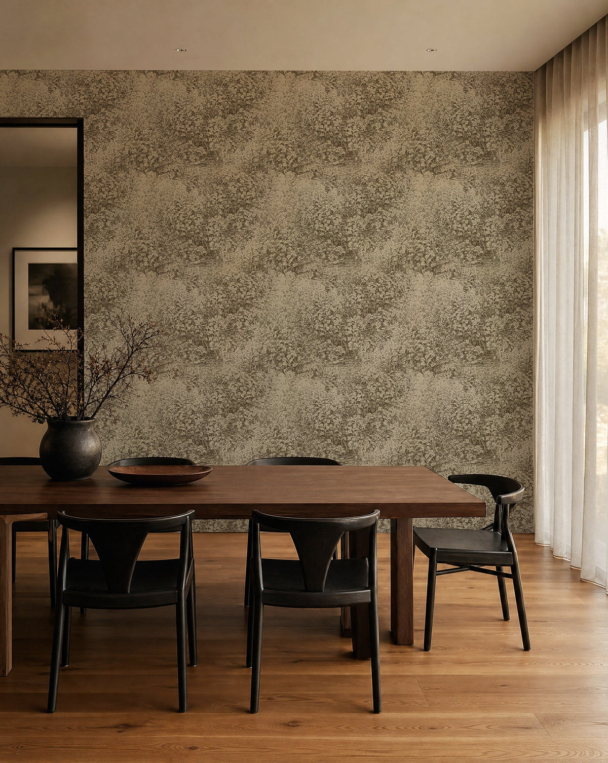 Brown and cream hand-sketched foliage wallpaper installed in a dining room