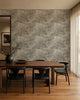 Gray and ivory hand-sketched foliage commercial wallcovering installed in a dining room