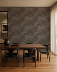 Charcoal and taupe hand-sketched foliage commercial wallcovering installed in a dining room