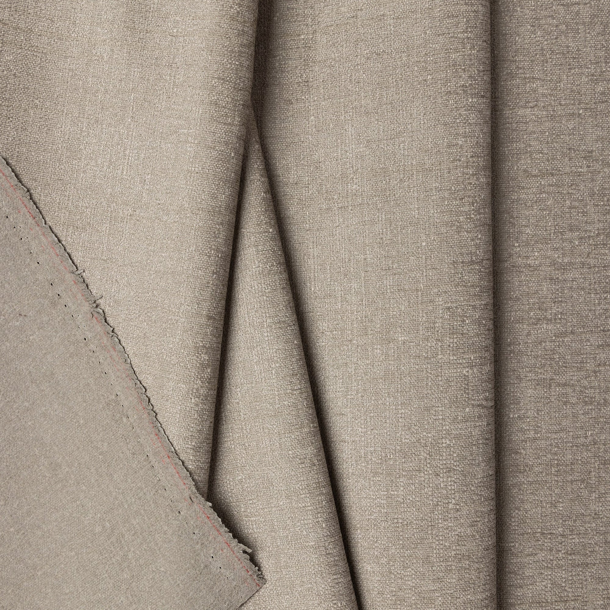 Gray chenille upholstery fabric by the yard, folded showing drape and weight