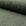 Green chenille upholstery fabric by the yard, rolled bolt view