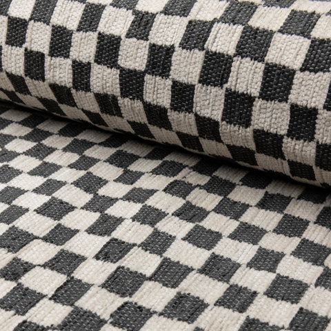 Black and ivory checkerboard jacquard upholstery fabric by the yard, rolled bolt view