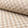 Cream and tan checkerboard jacquard upholstery fabric by the yard, rolled bolt view