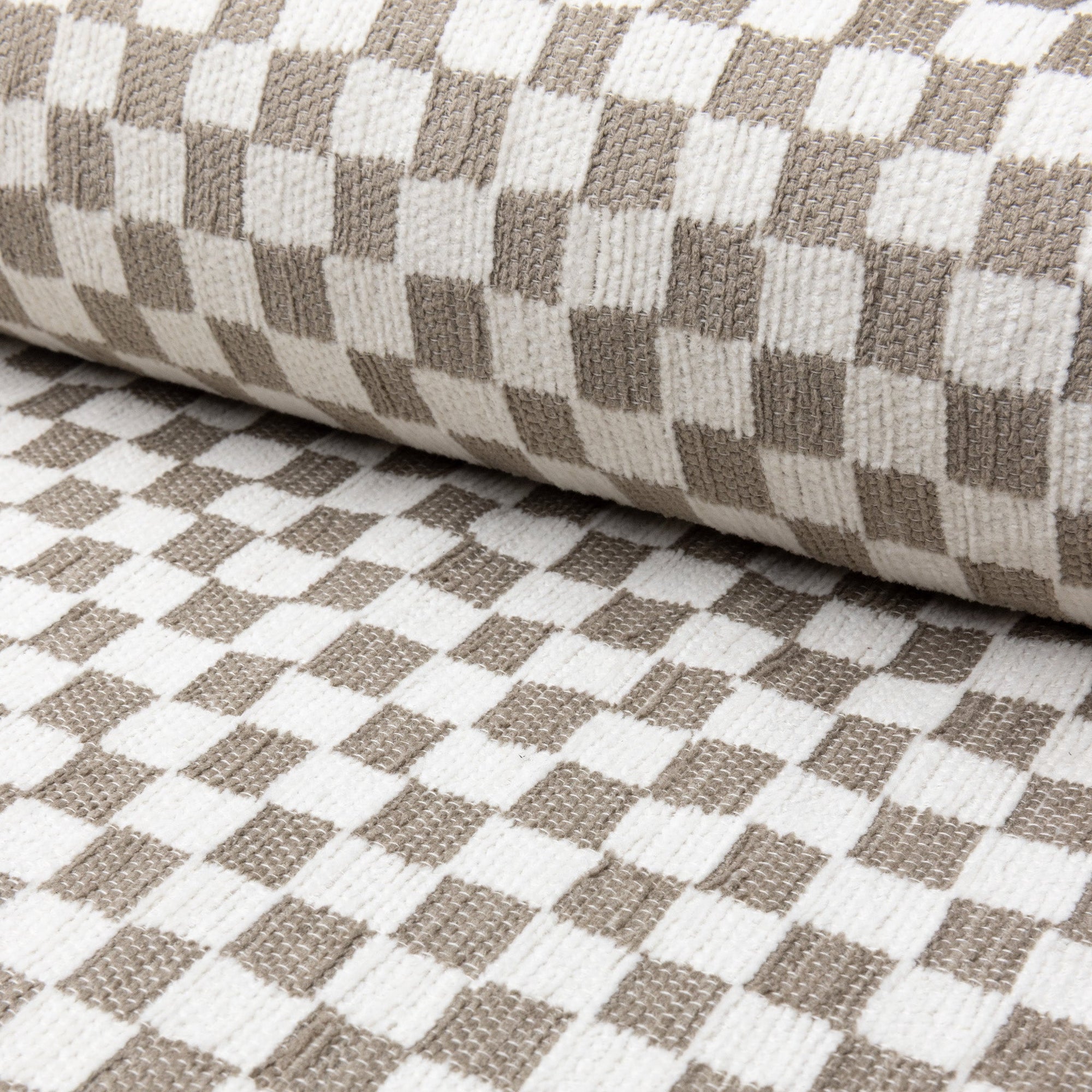 Light gray and cream checkerboard jacquard upholstery fabric by the yard, rolled bolt view