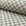 Olive green and cream checkerboard jacquard upholstery fabric by the yard, rolled bolt view