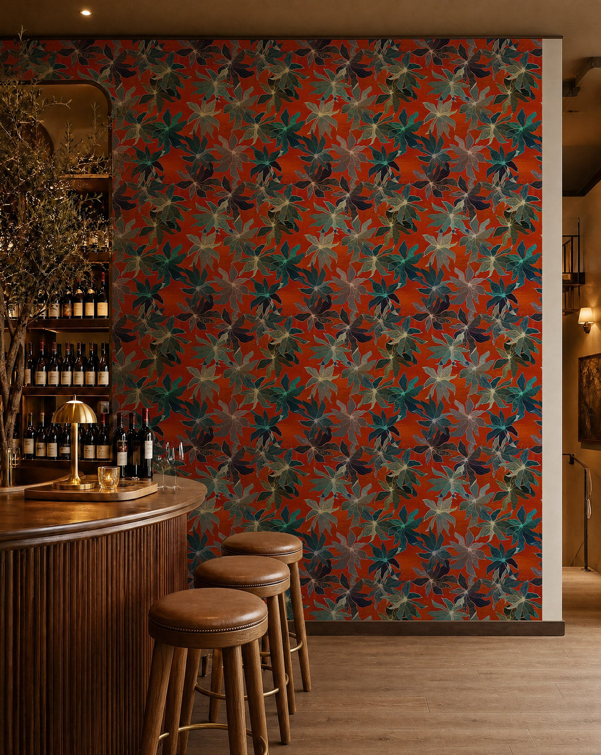 Teal floral on orange-red wallpaper installed behind a wine bar