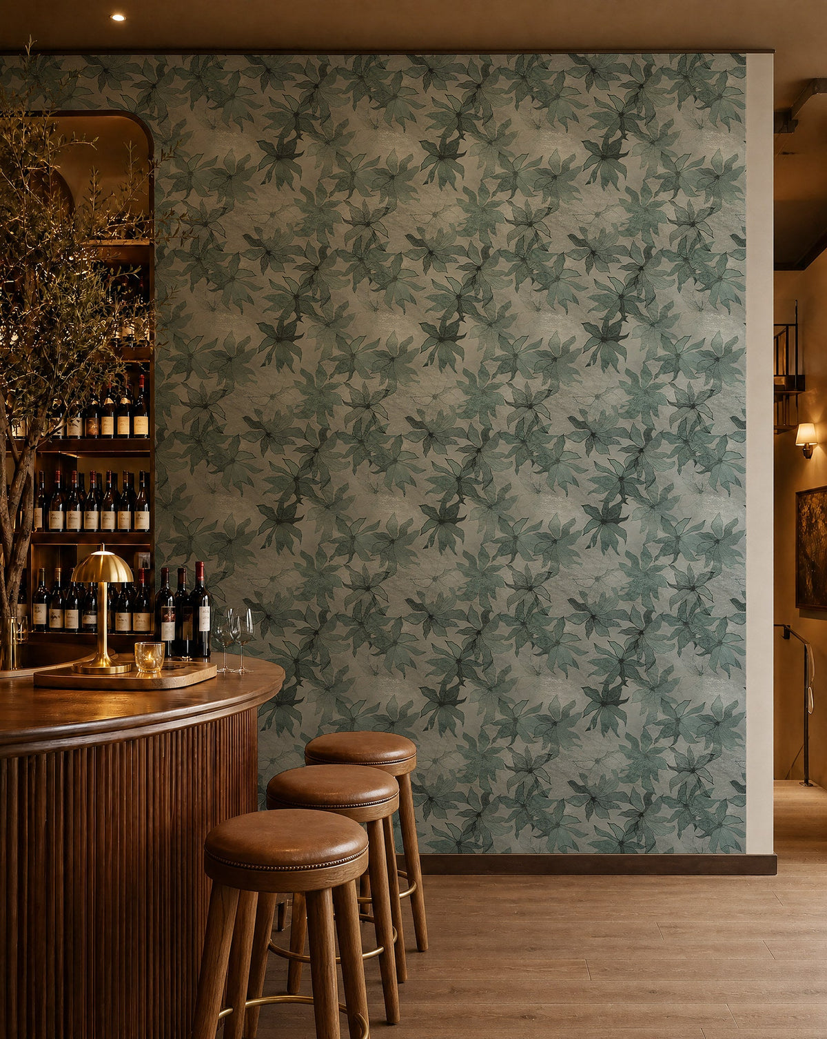 Soft teal and white watercolor floral wallpaper installed behind a wine bar