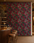 Green and pink floral on fuchsia commercial wallcovering installed behind a wine bar